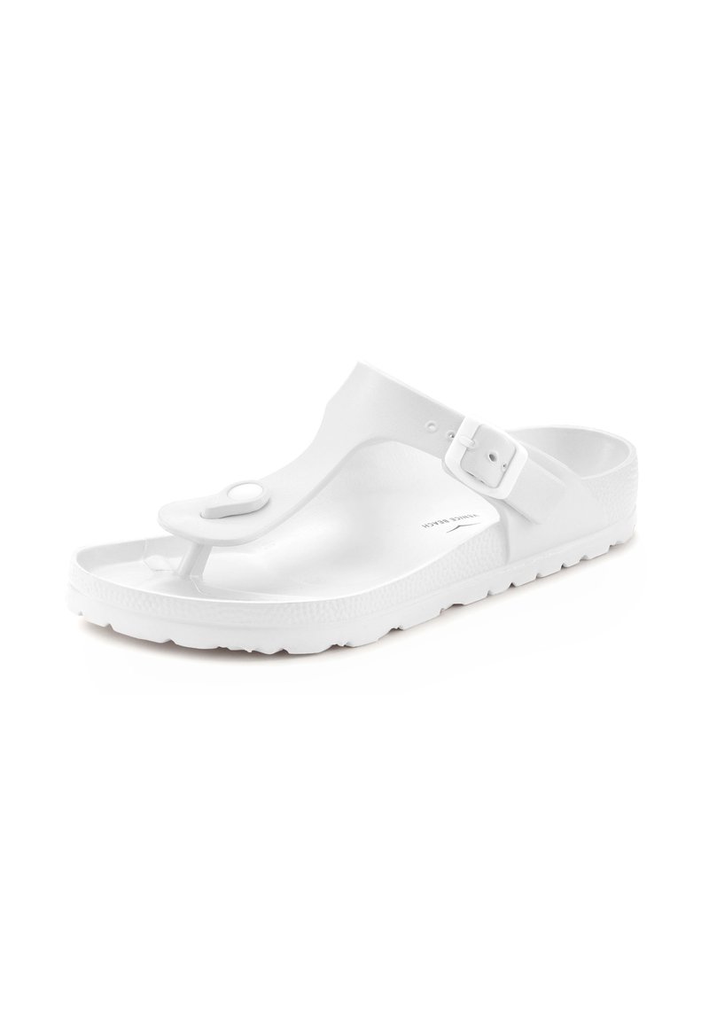 White sandal featuring a toe post design, adjustable buckle, smooth texture, and a contoured sole with patterned grip for traction.