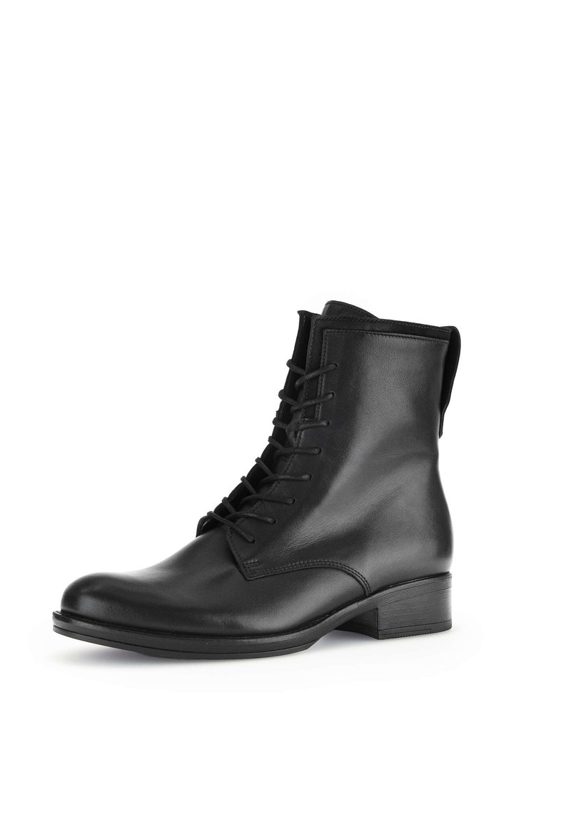 Bottes en cuir noire de cheville avec un bout rond, un laçage à l'avant et un petit talon empilé. Texture lisse et détails minimaux sur la surface.