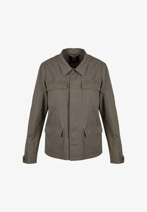 Olive rohelise värvi jakk tugevast kangast, millel on nööbid sangaosa, kaks esi-taskut ja reguleeritavad mansetid. Minimalistlik disain ja struktuur.