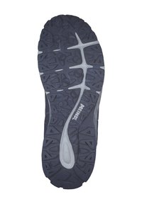 Black rubber shoe sole with multi-directional tread pattern for traction. Notable white accents and brand logo visible on the side.
