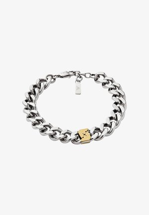 Silver metal chain bracelet featuring thick links, a textured gold accent clasp, and a small metal tag with engravings.