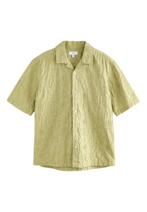 Short-sleeve shirt in light green, featuring an embossed swirl pattern, a collar, and front buttons. Made from textured fabric.