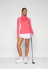 J.LINDEBERG Sports MAE QUARTER ZIP MID LAYER - Pikkade varrukatega topp - azalea