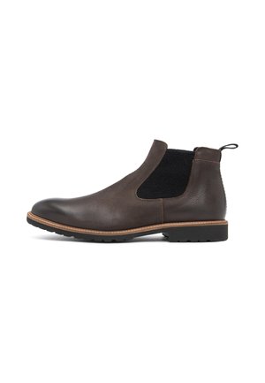 Brauner Chelsea-Lederstiefel mit schwarzem elastischem Seiteneinsatz, Zuglasche an der Ferse, genähter Sohle und profiliertem schwarzem Gummiprofil.
