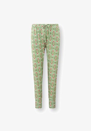 Groene broek met een patroon van bloemen in roze en wit. Aanpasbare tailleband met trekkoord. Aansluitende pasvorm met elastische boorden.