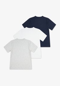 Three short-sleeve T-shirts in gray, white, and navy, made of cotton with a classic crew neckline and smooth texture.