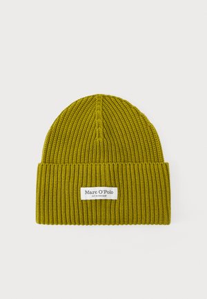 Green knitted beanie with a ribbed texture and a folded cuff, featuring a white label with "Marc O'Polo" branding stitched on.