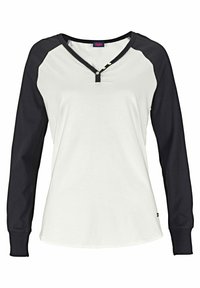 Long-sleeve shirt with a white body and black raglan sleeves, featuring a V-neckline and button detailing at the collar.