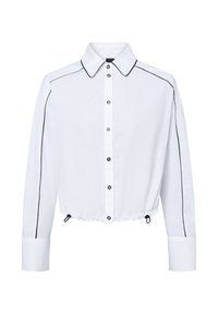 Weißes, kurzes Hemd mit spitzem Kragen, schwarzem Seitenpaspel, Knopfverschluss vorne und gerafftem Saum. Lange Ärmel mit Knopfmanschetten. Glattes Material.