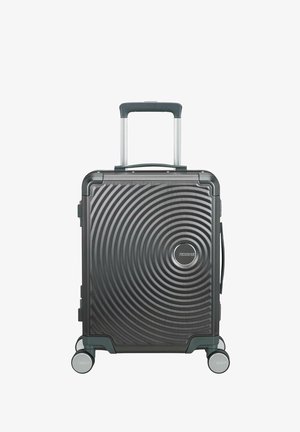 Valise trolley rigide gris foncé avec motif de cercles concentriques, quatre roues, poignée rétractable et poignée latérale.