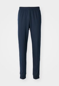 Pantalons de sport navy en tissu lisse, dotés d'une taille élastique et de jambes fuselées avec des poignets côtelés à la cheville.