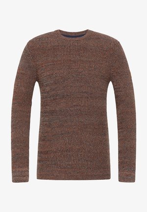 Rudas megztinis su ilgomis rankovėmis, apvalia iškirpte ir tekstūruotu raštu. Yra subtilių daugiatonių detalių ir mažas logotipas ant rankovės.