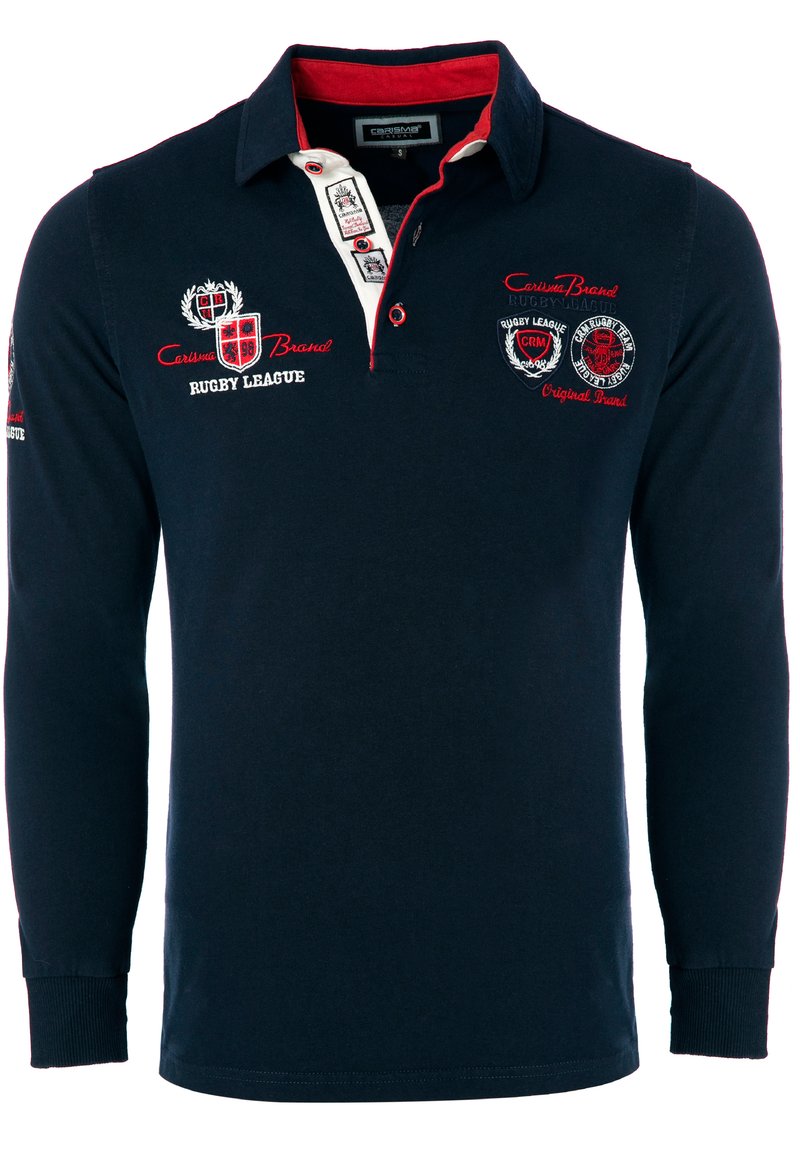 Tumedate pikkade varrukatega rugby polo särk punaste aktsentidega, nupuvajutuse dekoratsioon, tikitud logod ja soonikkoes varrukate otsad. Puuvillane kangas tagab mugavuse.