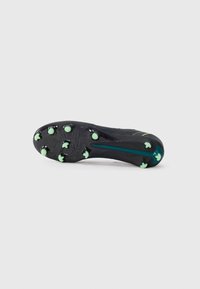 Black soccer cleat with a textured sole, featuring green studs and a streamlined shape. Accents include a teal stripe and subtle patterns.