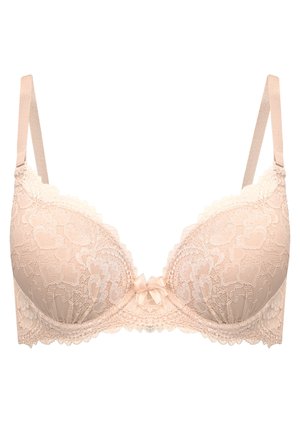 Blonde-bh i nude farve med bølget kant, polstrede skåle og en lille satin sløjfe i midten. Justerbare stropper for pasform.