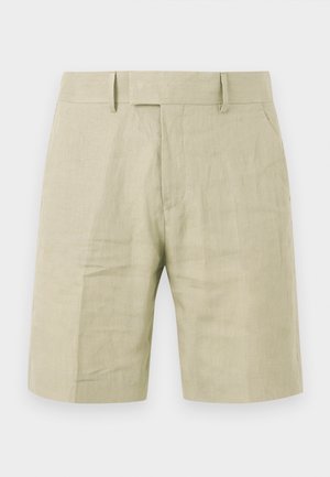 Pantaloncini beige di lino alla altezza del ginocchio con passanti per cintura, tasche laterali e chiusura frontale con zip, mostrati su sfondo bianco.