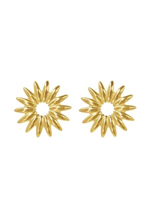 Paar glänzende goldene Ohrringe in Form von Sonnenstrahlen mit spitzen Strahlen, die von offenen kreisförmigen Zentren ausgehen.