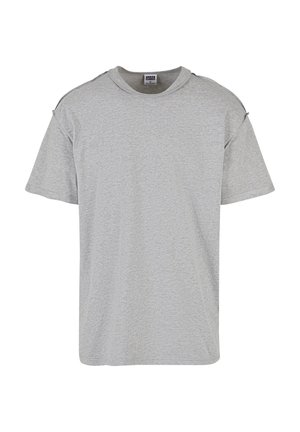 T-shirt gris à manches courtes avec un col rond et une coupe décontractée. Fabriqué en coton doux et texturé avec des détails de couture subtils sur les épaules.