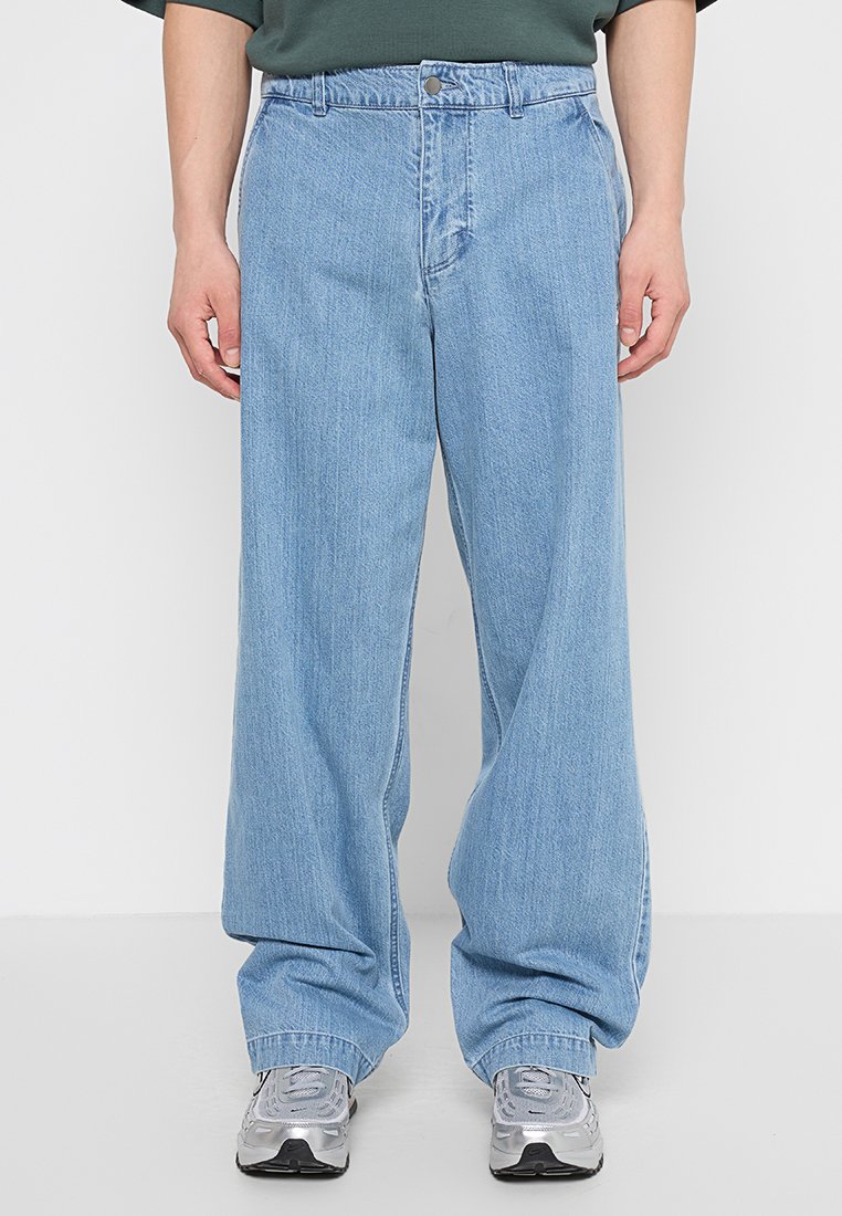 Nike Sportswear Wijde jeans lichtblauw Nike Sportswear Wijde jeans lichtblauw