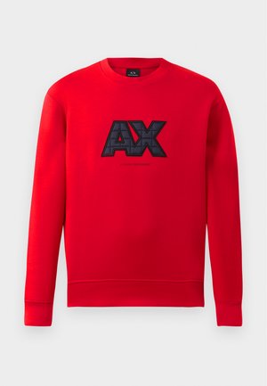 Felpa rossa con logo "AX" ricamato in nero sul davanti. Ha un collo rotondo e maniche lunghe con polsini a coste.