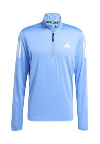 Light blue long-sleeve sport shirt with a quarter zipper, made from smooth fabric. Features white three-stripe accents on both sleeves.