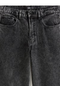 Zwarte denim jeans met een klassiek ontwerp, vijf zakken en subtiele vervaging. Voorzien van een knoop- en ritssluiting.