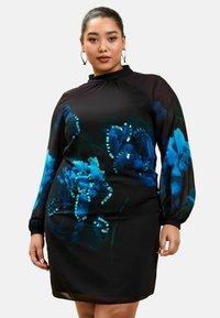 Rochie neagră cu flori, cu mâneci lungi, având flori albastre și accente verzi. Fabricată dintr-un material ușor, cu decolteu înalt și croi lejer.
