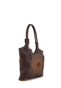 Brown leather tote bag with woven circular pattern on the front and smooth texture. Features dual handles and a flat base for stability.