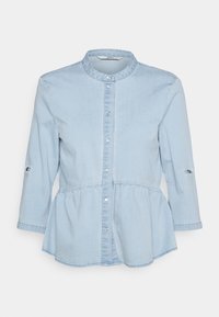 Light blue denim shirt with a round collar, button front, three-quarter sleeves, and a peplum hem. Features subtle gathering at the waist.