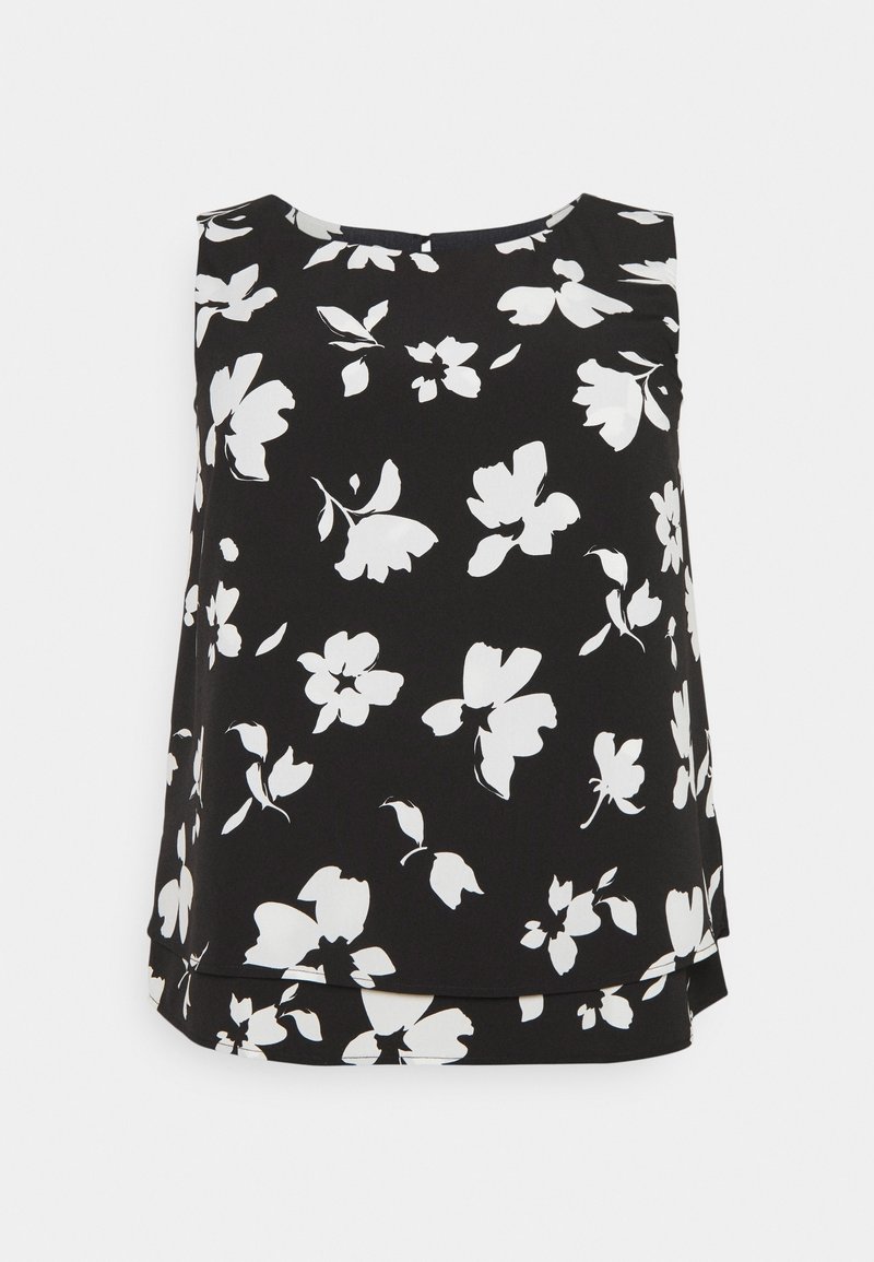 Blouse noire sans manches avec imprimé floral blanc et ourlet à volants.