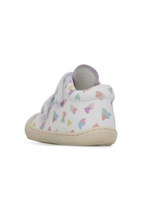 Children's boots made of white synthetic material, featuring a multicolored heart pattern, with a velcro strap and textured sole.