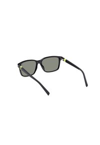 Occhiali da sole neri con lenti rettangolari, tinta grigia, montatura in plastica nera e finitura opaca. Accento verde neon sulle tempie.