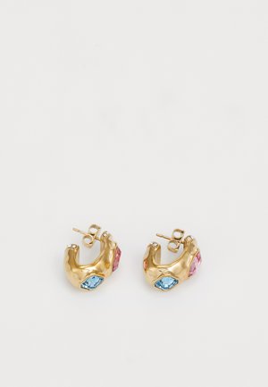 Gold hoop earrings featuring blue and pink faceted gemstones, with a smooth metallic texture and stud closure.