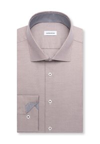 Chemise habillée à manches longues pliée en tissu texturé léger avec boutons blancs et intérieur de col et poignets à motifs contrastants.