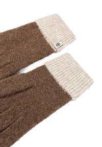 Braune Wollhandschuhe mit gerippten cremefarbenen Bündchen und einem kleinen Markenetikett. Die Textur ist weich und fusselig, mit einem nahtlosen Design für Komfort.