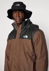 The North Face M EVOLVE II TRICLIMATE JACKET - EU - Hardshell jacket - smokey brown/black