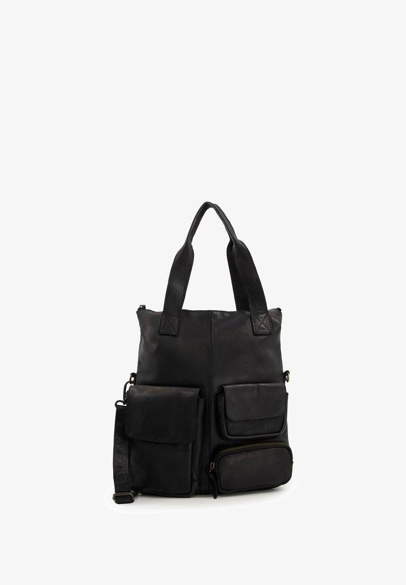 Black leather tote bag with two front pockets, a small zippered compartment, and dual top handles; features a smooth texture and structured design.