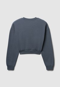 Skórzana bluza w ciemnoniebieskim kolorze, o gładkiej fakturze, z prążkowanym dekoltem i mankietami oraz opadającymi szwami ramion. Prosty design bez wzorów.