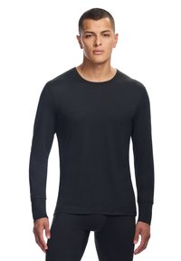 Langarmshirt in Schwarz aus einem glatten, dehnbaren Stoff mit rundem Ausschnitt und eng anliegenden Bündchen, mit einem minimalistischen Design.