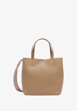 Beige leather tote bag with two short handles and a removable woven strap. Logo "BIMBA Y LOLA" displayed on the front. Smooth texture.