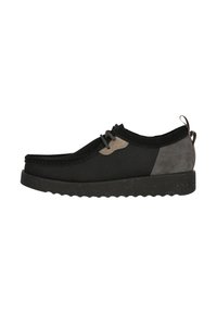 Black mesh and suede slip-on shoe with grey accents, round toe, textured midsole, and lacing detail, featuring a pull tab at the heel.