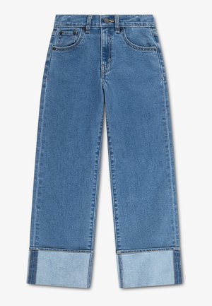 Jeans en denim bleu à jambes larges avec revers retroussés, bouton avant et cinq poches, posés à plat sur fond blanc.