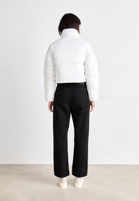 Calvin Klein Jeans HERO 90S STRAIGHT - Straight leg jeans - classic black