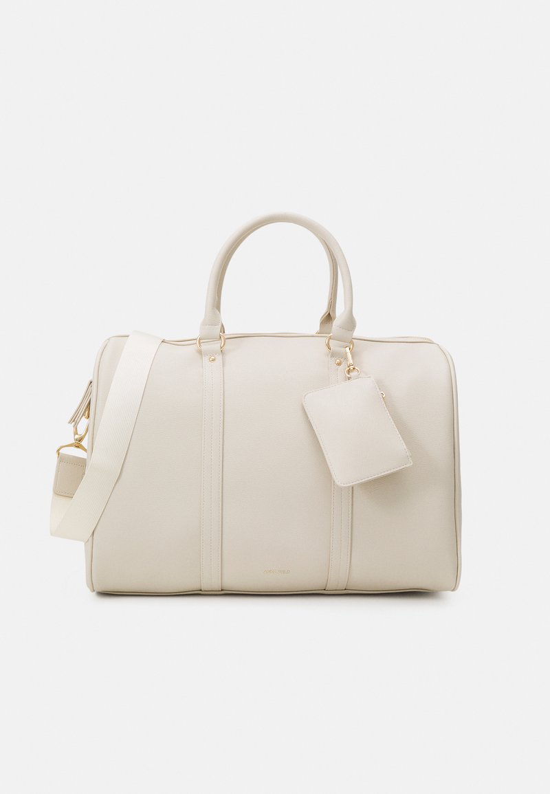 Beige duffel bag made of synthetic leather, featuring gold-tone hardware, dual top handles, and a detachable shoulder strap. Includes a zippered cardholder.