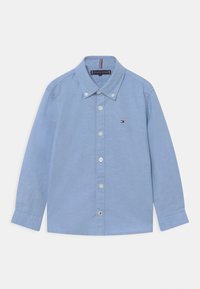 Himmelblaues Langarm-Hemd mit Knopfleiste und Button-Down-Kragen sowie einem kleinen, auf die Brust gestickten Tommy Hilfiger-Logo.