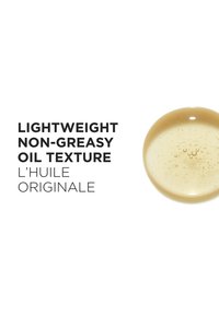 Lightweight, non-greasy oil in a round, translucent, light amber droplet with bubbles, accompanied by bold black text.