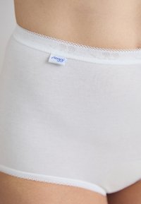 White cotton briefs with a smooth texture, lace trim at the waistband, and a small blue label displaying the brand name.