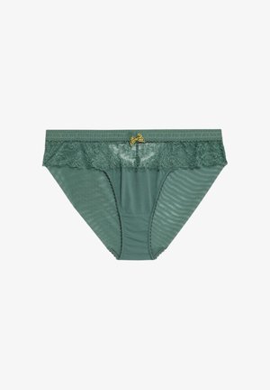 Ropa interior verde para mujer con borde de encaje en la parte superior y un pequeño lazo decorativo amarillo en la cintura central.