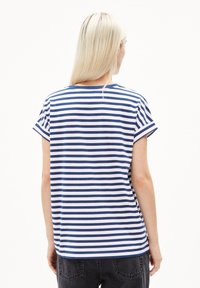 Striped t-shirt featuring navy blue and white horizontal stripes, short sleeves, and a crew neck, made of lightweight cotton fabric.