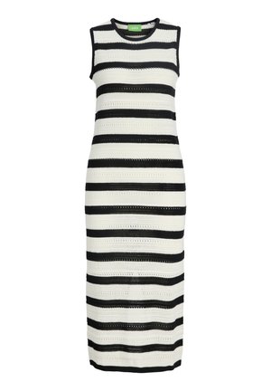 Vestido de punto sin mangas hasta la rodilla con rayas horizontales en blanco y negro y escote redondo.